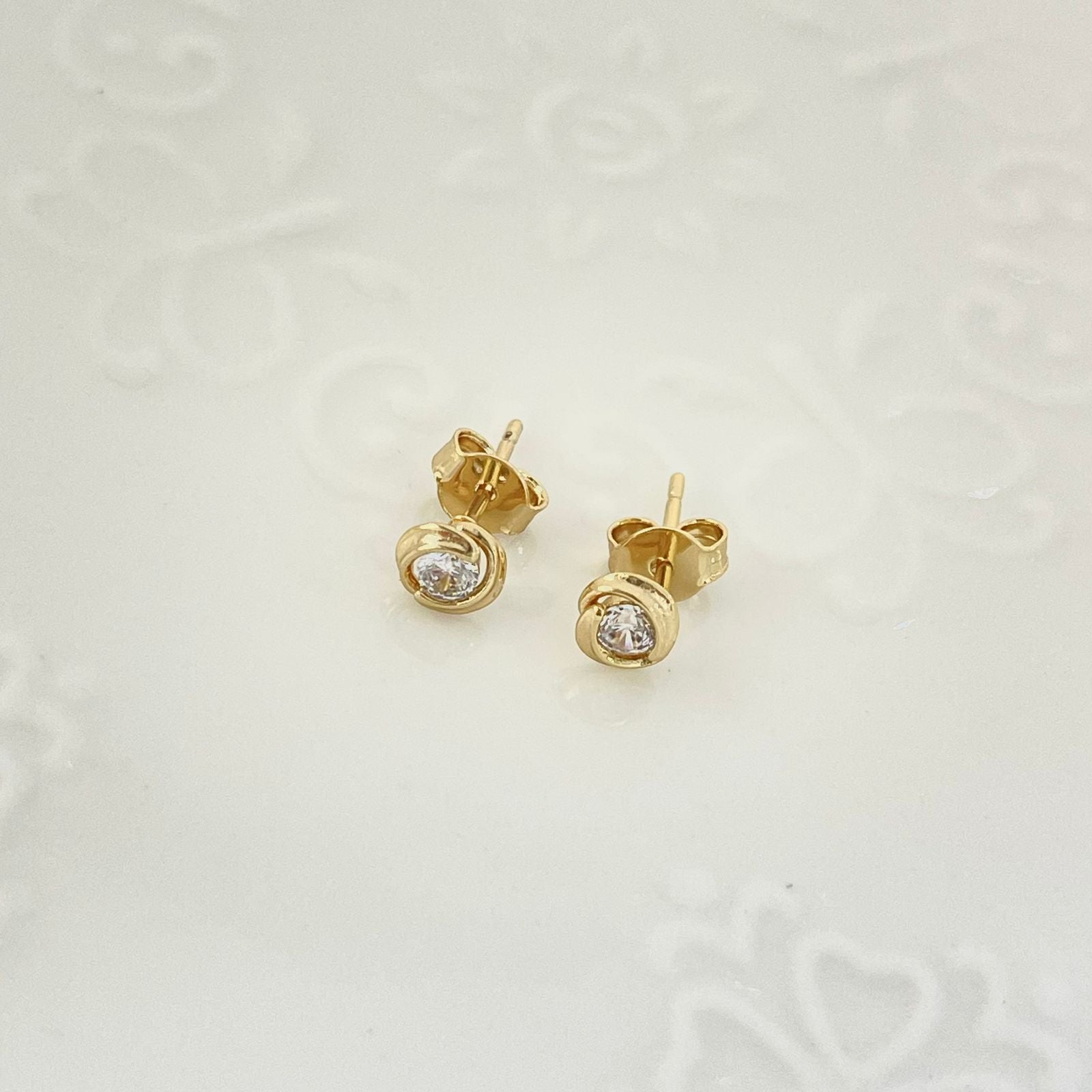 Topo Emtorchado Con Circon Blanco 6mm ID: 228